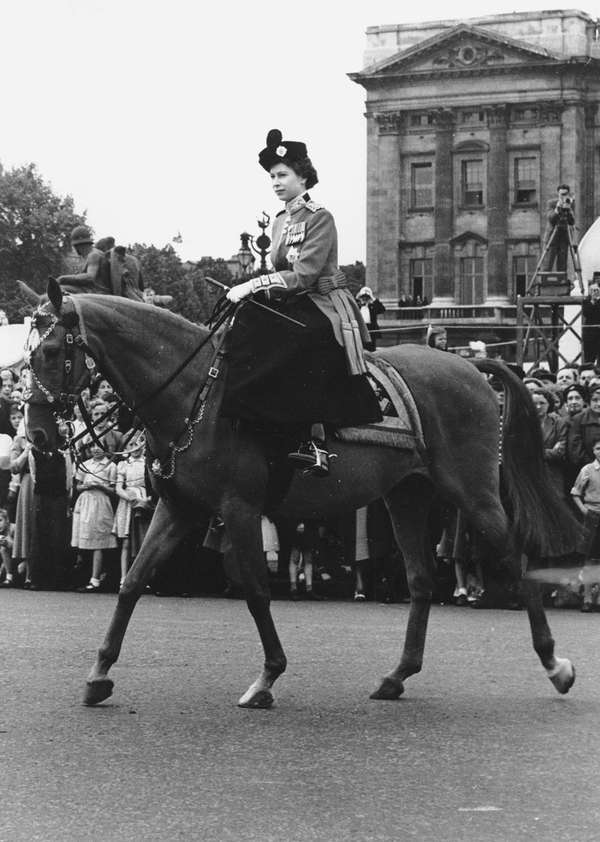 Queen Elizabeth II leaving Buckingham Palace on horseback for the Trooping of the Colour Ceremony at Horse Guards Parade, June 4, 1952.