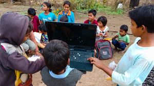 Explore India's efforts to improve its education system by including e-learning via satellite classrooms
