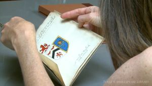 See an illustrated manuscript of 16th-century coats of arms, including commentary on whether Shakespeare is worthy of one