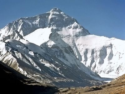 Mount Everest the highest point on Earth, with a summit at 29,035 ft (8,850 m) on the border between Nepal and the Tibet Autonomous Region of China. Peak on the crest of the Himalayas, southern Asia. English explorer George Mallory
