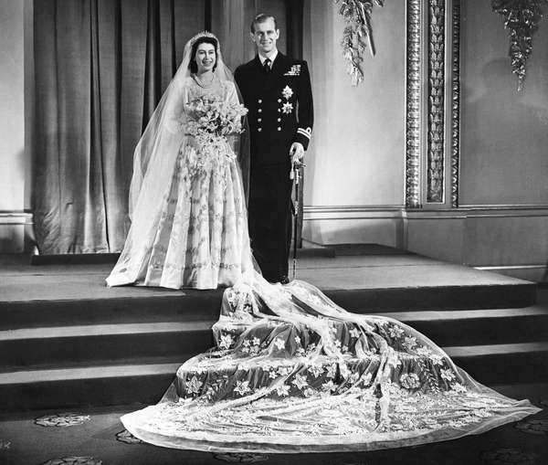 Princess Elizabeth and Lieutenant Philip Mountbatten at Buckingham Palace (London, England) after their wedding ceremony on November 20, 1947. (Queen Elizabeth II, Duke of Edinburgh, British royalty, marriage)