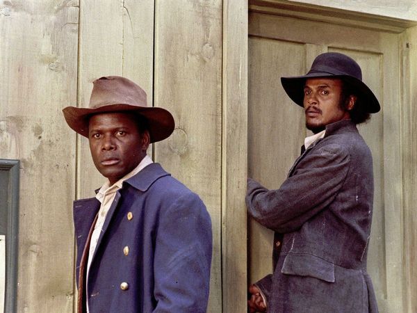 Publicity still of Sidney Poitier, left, and Harry Belafonte in a scene from the 1972 western film Buck and the Preacher directed by Sidney Poitier. movie cinema