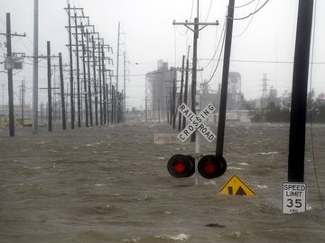 Hurricane storm surge - Floodwaters cover a railroad crossing as a storm surge caused by Hurricane Gustav surged over the side of a levee on the Industrial Canal in New Orleans, Louisiana, September 1, 2008.  weather natural disaster