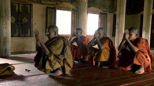 Hear about the terror of the Khmer Rouge, their suppression of religion and the later revival of Wat Bo monastery